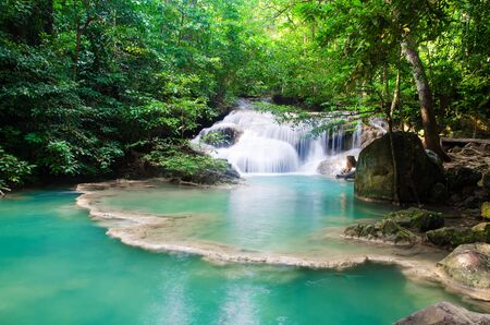waterfall in deep forest , thailand の写真素材