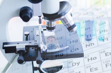 Close-up shot of microscope with metal lens at laboratory. Scientific and healthcare research background.の写真素材