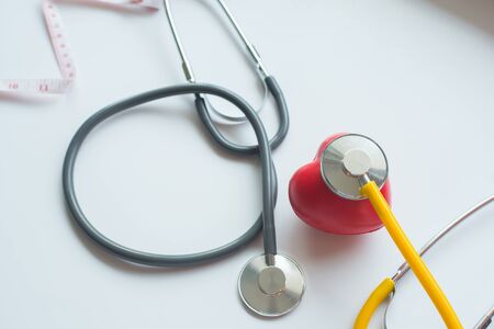 stethoscope and red heart symbol of health day and good healthy lifeの写真素材