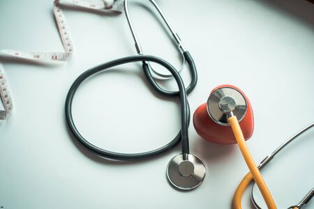 stethoscope and red heart symbol of health day and good healthy lifeの写真素材