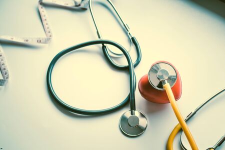 stethoscope and red heart symbol of health day and good healthy lifeの写真素材