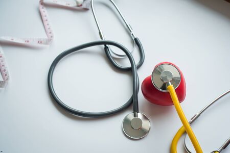 stethoscope and red heart symbol of health day and good healthy lifeの写真素材