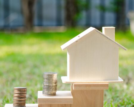 Real estate business concept. wooden House on a white backgroundの写真素材