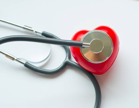 stethoscope and red heart symbol of health day and good healthy lifeの写真素材