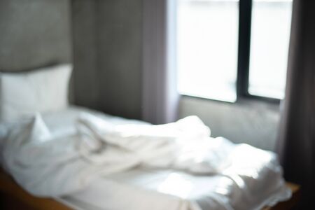 defocus blur abstract background of modern bedroom interiorの写真素材
