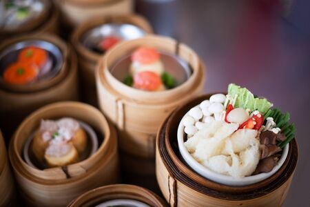 yumcha, dim sum in bamboo steamer, chinese cuisineの写真素材