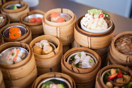 yumcha, dim sum in bamboo steamer, chinese cuisineの写真素材