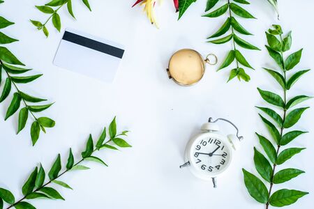 clock and veintage pocket watch on white backgroundの写真素材