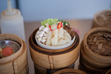 yumcha, dim sum in bamboo steamer, chinese cuisine