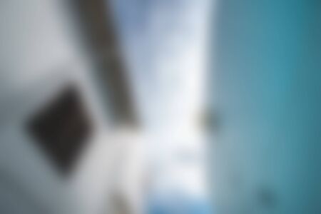 White blur abstract background from building hallway (corridor)の写真素材