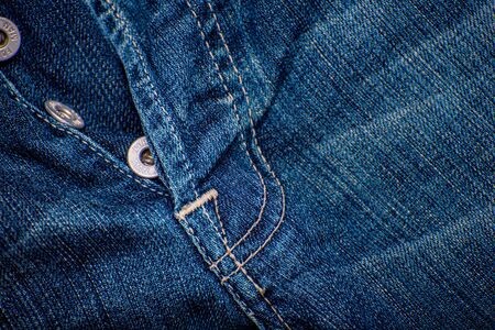 background of blue jeans denim textureの写真素材