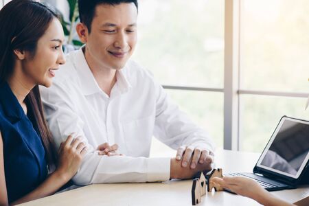 Couples start their marriage By buying real estateの写真素材