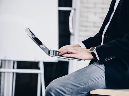 business man on relax place doing job on labtopの写真素材