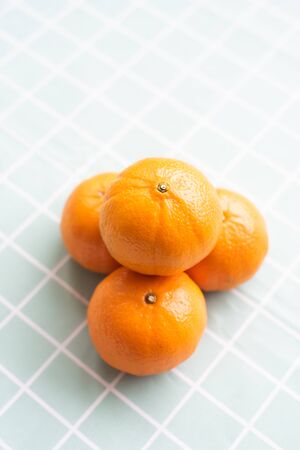 orange on paper backgroundの写真素材