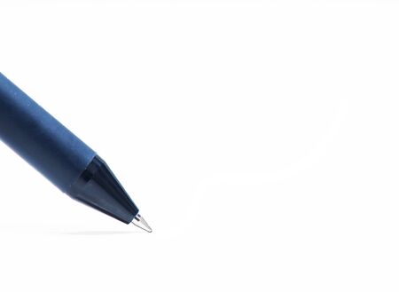 blue pen signing white paper .の写真素材