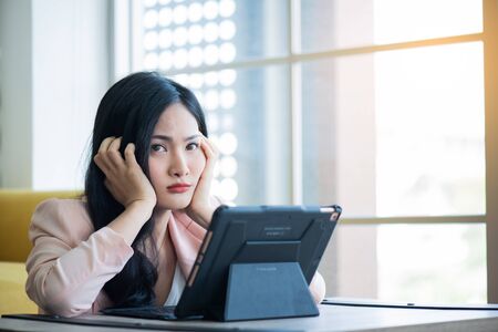women stressful on working in office  ,Office syndrome conceptの写真素材