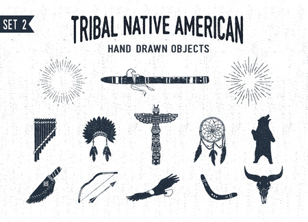Hand drawn tribal icons set with flutes, headdress, totem pole, dream catcher, grizzly bear, knife, bow, eagle, boomerang, and buffalo skull vector illustrations.のイラスト素材