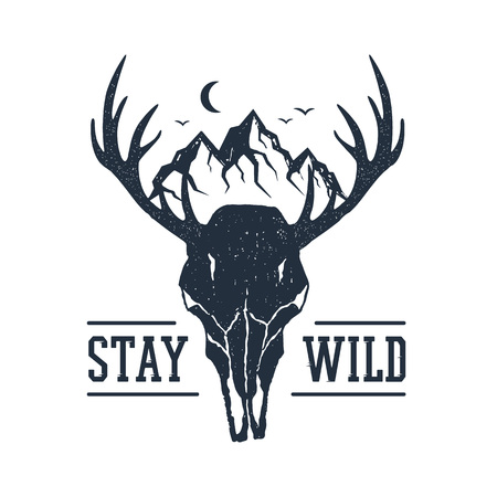 Hand drawn inspirational label with mountains and deer skull textured vector illustrations and "Stay wild" lettering.のイラスト素材