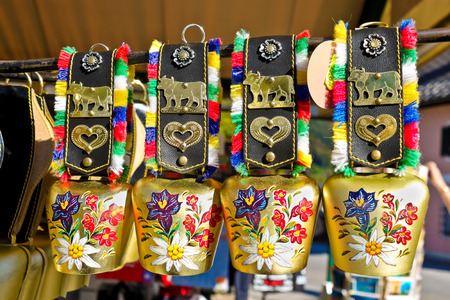 ST  GILGEN, AUSTRIA - OCTOBER 3, 2011  Ornate traditional cow bells for sale in a souvenir shop in St  Gilgen のeditorial素材