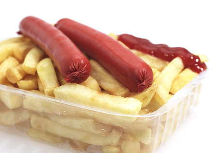 Sausage and French Fries against White Backgroundの写真素材