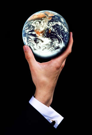 MAN HANDING EARTH, SYMBOLIC IMAGEの写真素材