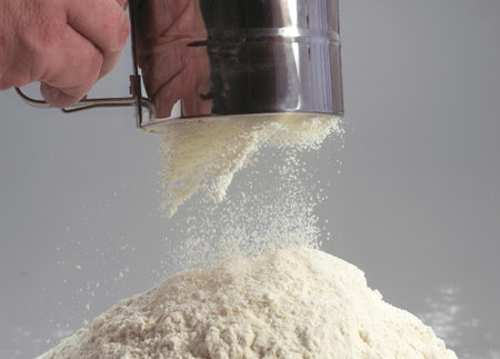 Sifted Flour against Grey Backgroundの写真素材