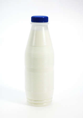Bottle of Milk against White Backgroundの写真素材