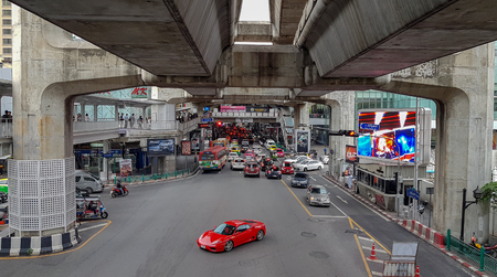 Bangkok, Thailand - September 16, 2018, a red car is solo turning at Chalerm Phao junction near Siam Paragonのeditorial素材