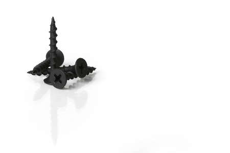 A few screws stacked on an isolated white backgroundの写真素材