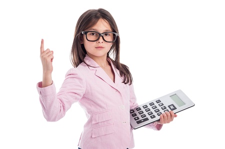 Young girl counting a calculator and holding up one finger. Isolated on white background.の写真素材