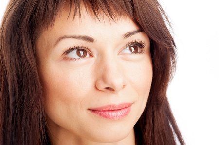 Close up portrait of pretty woman looking up の写真素材