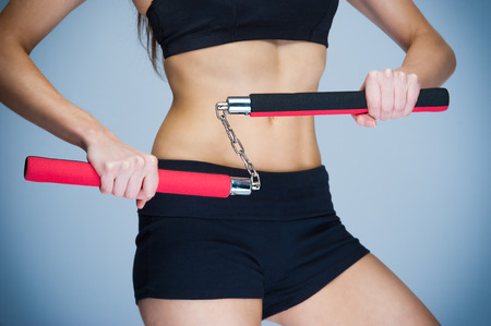 Fit woman training for self defence. Karate fitness workout.の写真素材