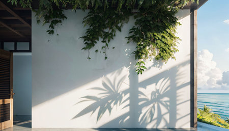 White wall with shadow of palm leaf on the beach. 3d renderingの素材