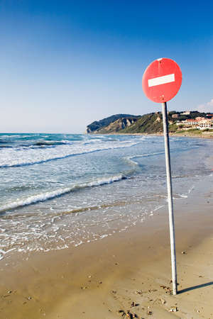 One way sign on the beachの写真素材