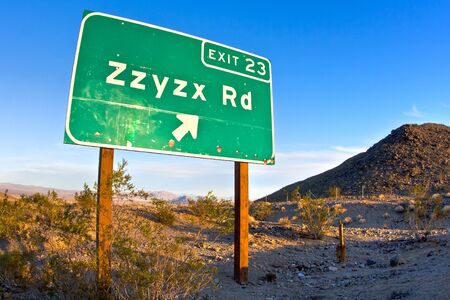 Zzyzx Road freeway sign along the Interstate 15 freeway near Baker, California の写真素材