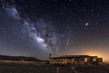 Milky Way, Meteor, and Abandoned Home in the desertのeditorial素材