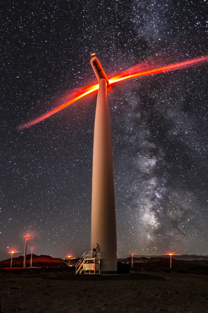 Wind turbine and Milky Wayの写真素材