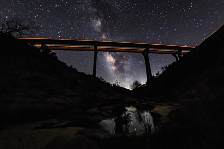 Pine Valley Creek Bridge and the Milky Way With Reflection in Water. San Diego County, California. Interstate 8 freeway.の写真素材
