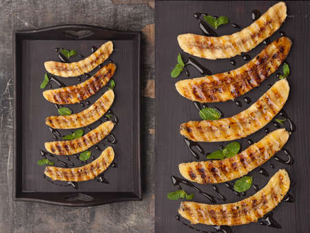Grilled bananas. Photo of food on a dark backgroundの写真素材