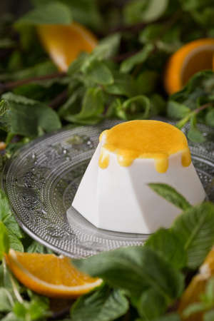 Sweets cake orange soufflÃ©. Photo of food on a white background.の写真素材
