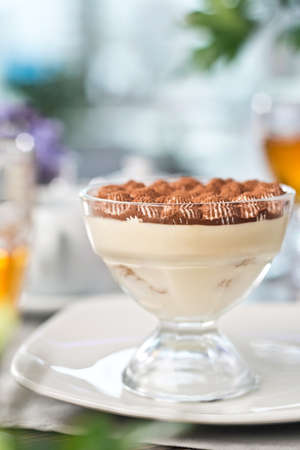 Chocolate brownie with cream, food photography.