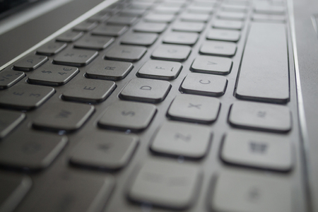 Keyboard with the D key primarily in focus