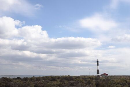 Wide angle view overlooking Fire Island Lighthouse located at Fire Island National Seashore, Long Island, New Yorkの写真素材