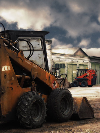 Two excavators in postapocalyptic style.の写真素材