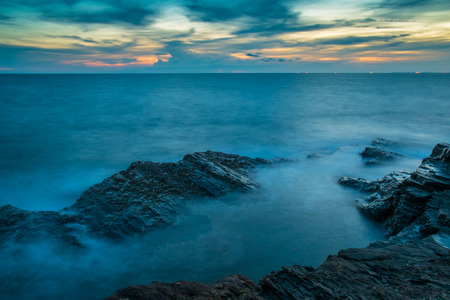 seascape with dramatic wave and rock in sunset at Khao Laem Ya National Park in Rayong province, Thailandの写真素材