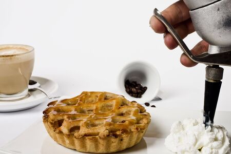 waffle and coffee cup with cream on isolated background

の写真素材