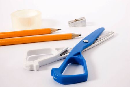 scissor, pencil and tape on isolated background



の写真素材