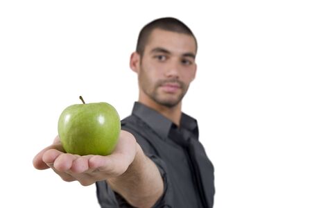 smart man offering apple on white backgroundの写真素材