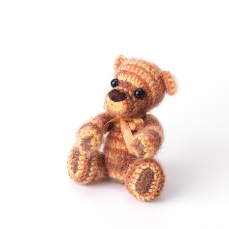 Teddy bear in classic vintage style isolated on white backgroundの写真素材