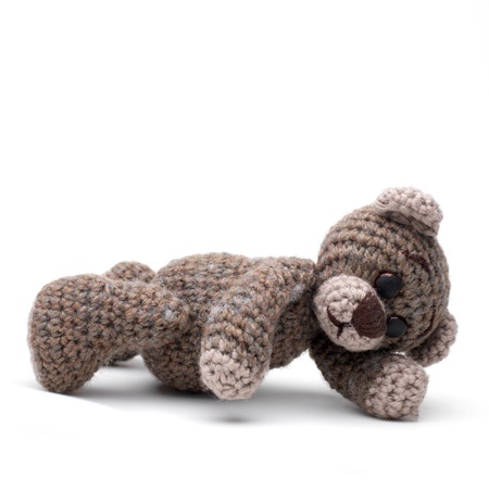 Teddy bear in classic vintage style isolated on white backgroundの写真素材